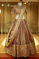 Chocolate Brown Munga Silk Woven Lehenga with Zardosi Beaded Work and Peacock Motif Broad Border