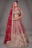 The Majestic Maroon Banarasi Silk Bridal Lehenga Ensemble with Jharokha Zardosi Blouse and Sheer Scalloped Veil