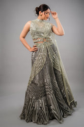 Metallic Green Smocked Satin Lehenga Set with Mirror-Embellished High-Neck Blouse