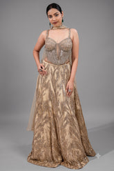 Champagne Beige Net Lehenga featuring Linear Sequin Trails and Beaded Tassel Bustier