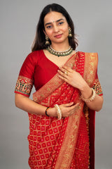 Red Georgette Traditional Bandhej Saree with Cutdana and Bead Work