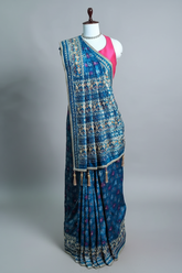Sky Blue Silk Traditional Woven Patola Saree with Cutdana and Beads Work