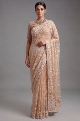 Beige Net Designer Saree Enriched With Glamorous Sequins And Cutdana Hand Embroidery