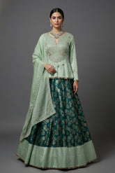 Teal Green Brocade Banarasi Silk Floral Woven Lehenga with Peplum Blouse