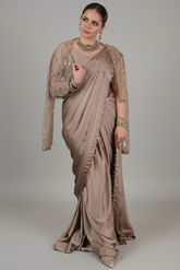 Taupe Satin Silk Pre Stitched Saree Featuring with a Narrow Embellished and Cutdana Short Cape Jacket