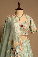 Aqua Green Tissue Designer Bead and Multi Thread Floral Work Lehenga