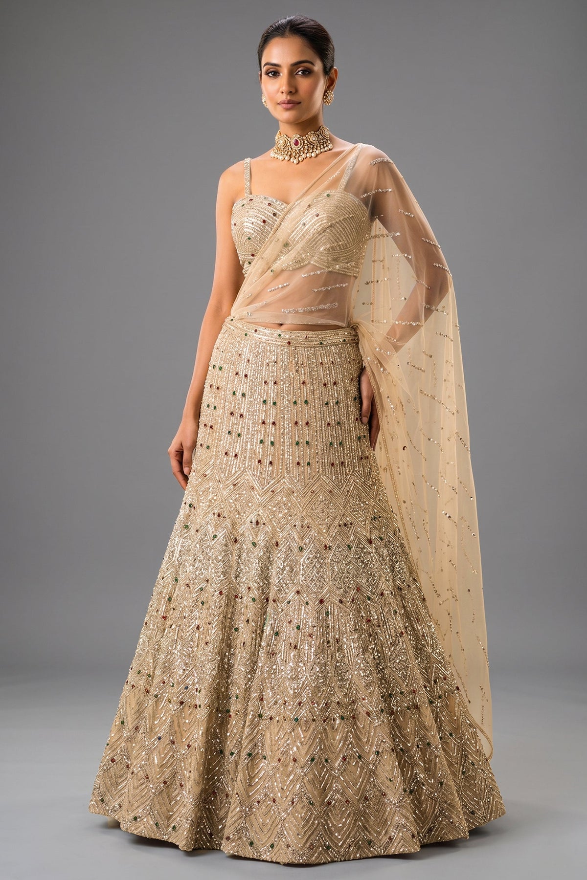 Champagne Gold Net Mermaid Lehenga with Attached Cape-Style Dupatta & Intricate Cutdana Work