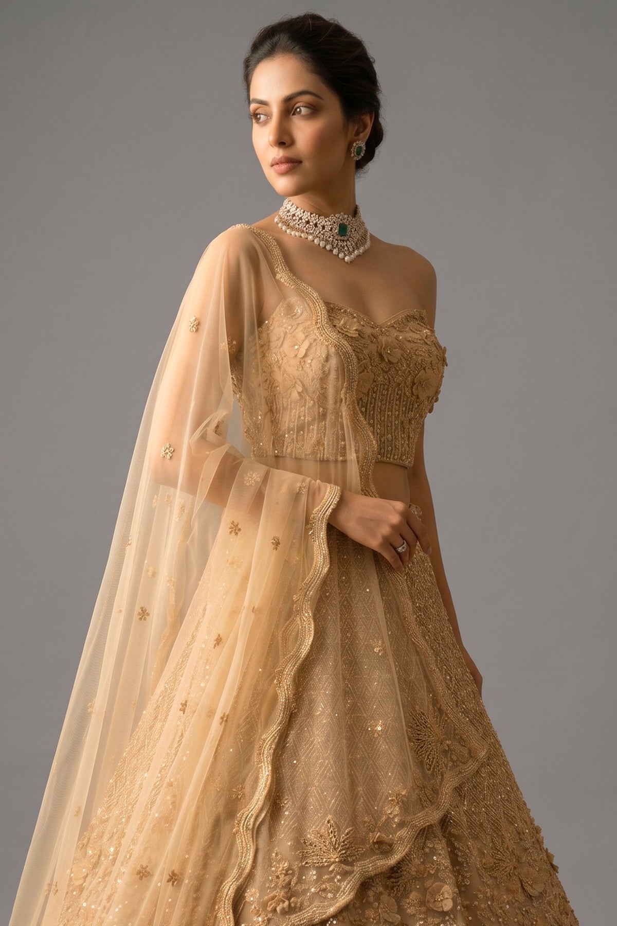 Champagne Gold Net Corset Lehenga with 3D Floral Appliqués and Architectural Cutwork