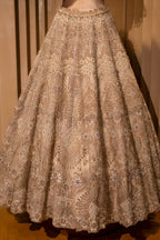 Ivory White Silk Bridal Lehenga with Ethereal Cutdana and Stone Artistry
