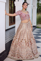 The Onion Pink Banarasi Brocade Silk Lehenga with Scalloped Crossover Choli and Handwork