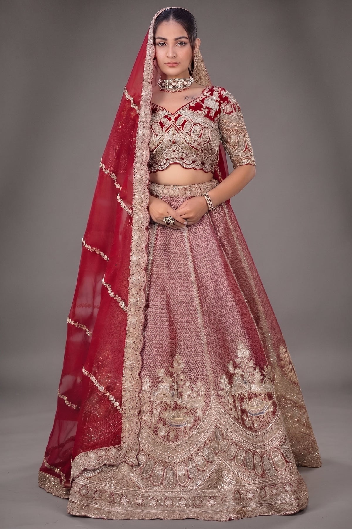 The Majestic Maroon Banarasi Silk Bridal Lehenga Ensemble with Jharokha Zardosi Blouse and Sheer Scalloped Veil