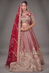 The Majestic Maroon Banarasi Silk Bridal Lehenga Ensemble with Jharokha Zardosi Blouse and Sheer Scalloped Veil