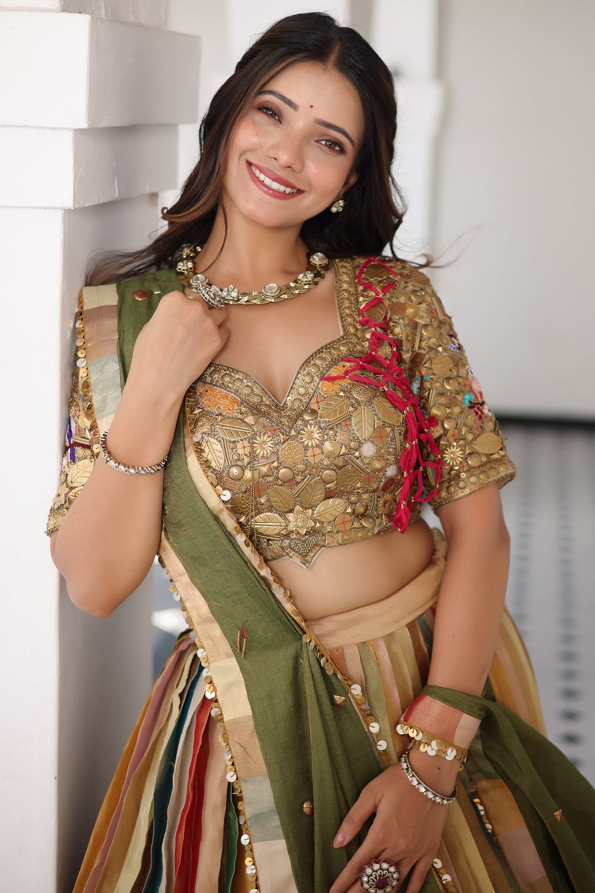 Multi Colored Tissue Silk Lehenga with Embellished Metal Work Blouse