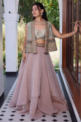 Muted Mauve Tissue Asymmetric Layered Lehenga Set With Heavily Embroidered Fusion Jacket