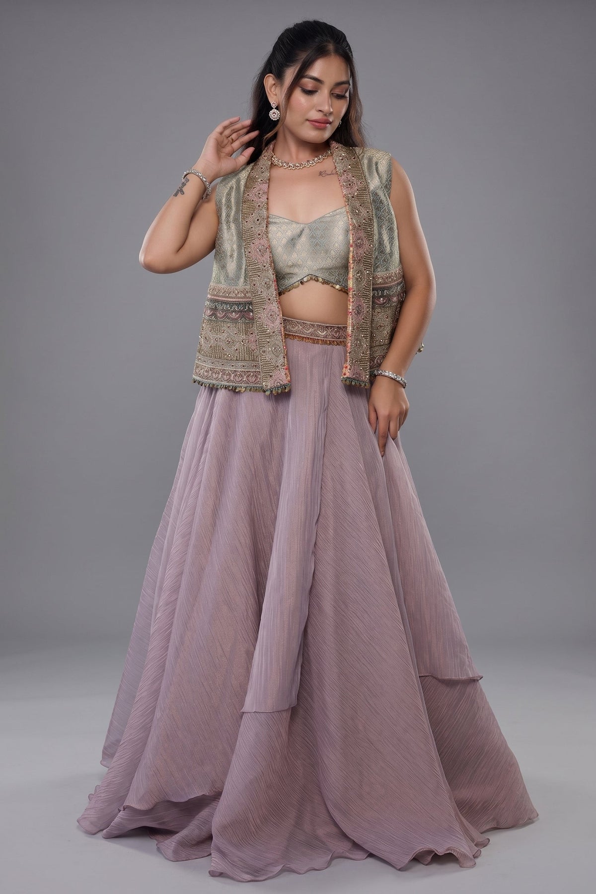 Muted Mauve Tissue Asymmetric Layered Lehenga Set With Heavily Embroidered Fusion Jacket