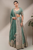 Olive Green Multi-Tonal Chinon Lehenga featuring Sequin-Highlight Pleated Skirt