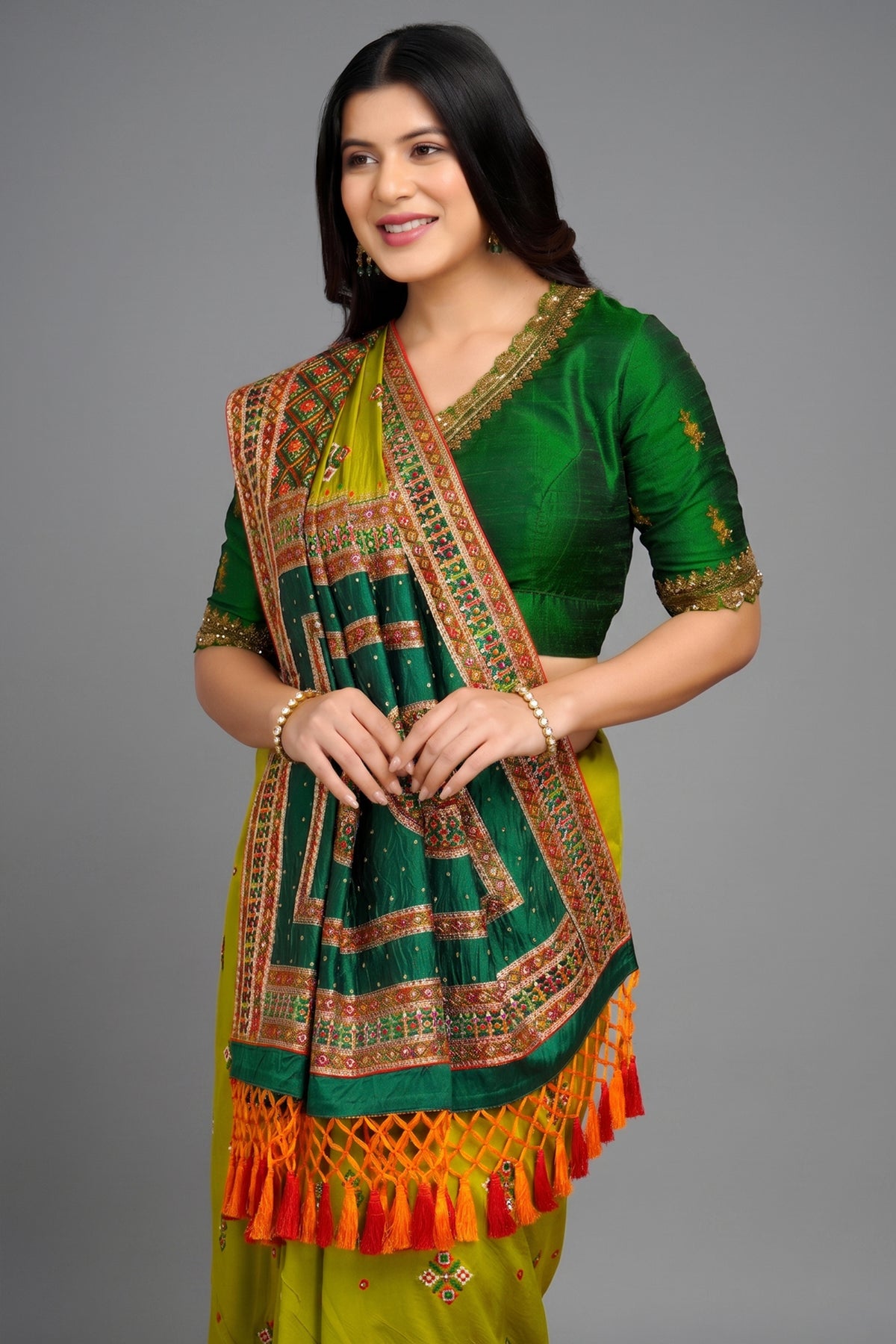 Olive Green Silk Broad Embroidered Border Saree with Tassels