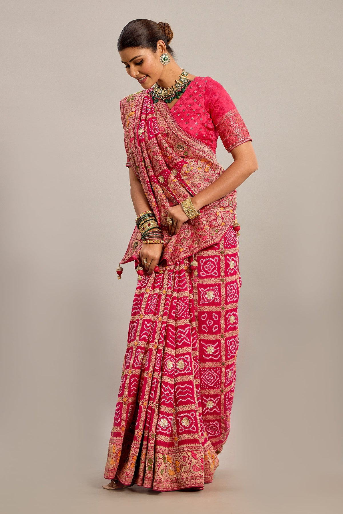 Pink Georgette Checks Bandhej Woven Saree with Pitta and Cutdana Work