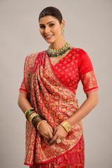 Red Satin Georgette Bandhej Woven Saree with Cutdana and Mirror Work