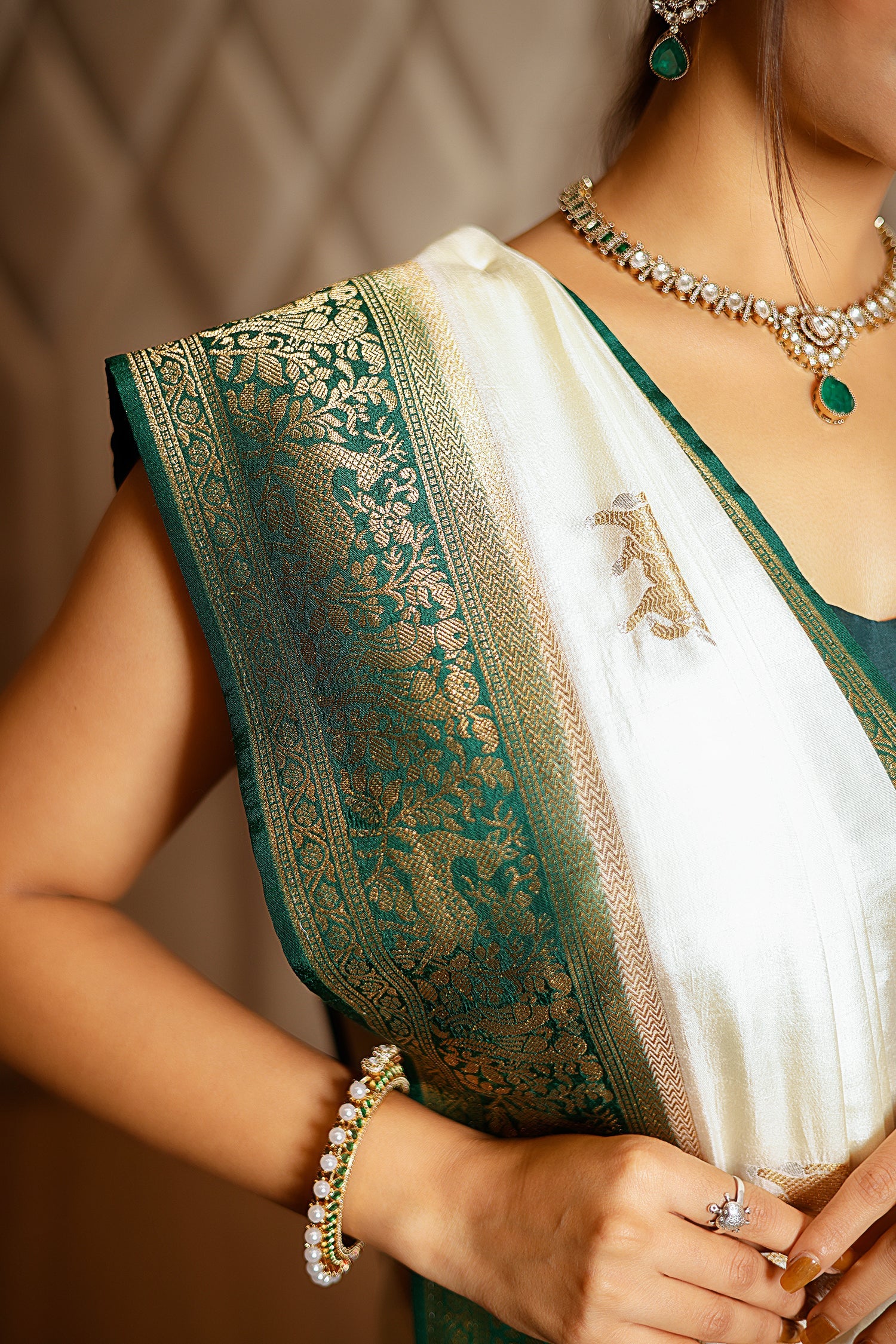 Off White Dola Silk Woven Butta Saree with Contrast Patola Border