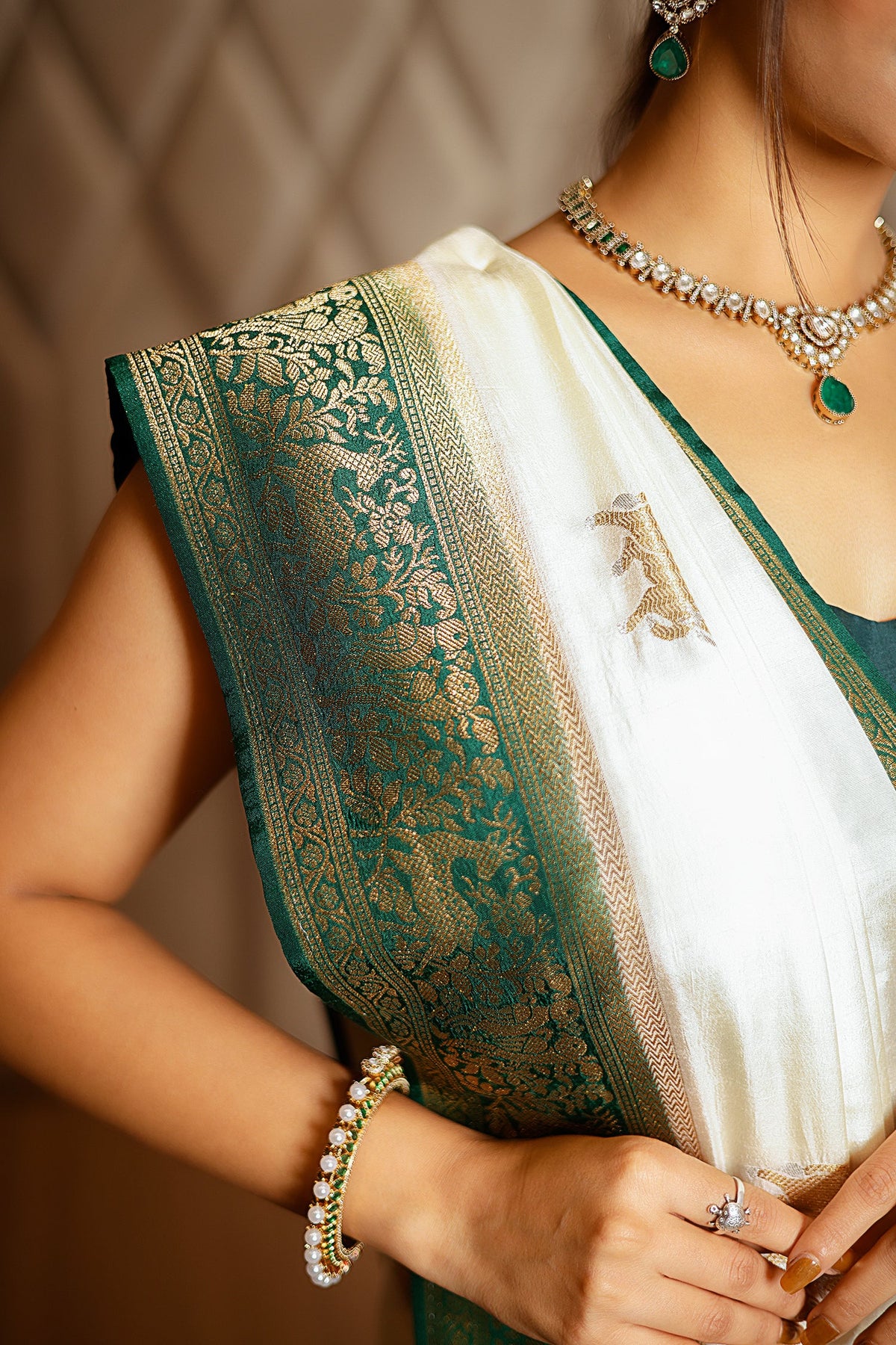 Off White Dola Silk Woven Butta Saree with Contrast Patola Border