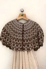 Cream Soft Organza Silk Weaving Stripe Saree with Poncho Blouse and Cutdana Work Scallop Border