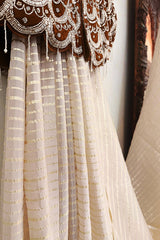 Cream Soft Organza Silk Weaving Stripe Saree with Poncho Blouse and Cutdana Work Scallop Border