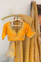 Yellow Tissue Woven Saree with Lace Work