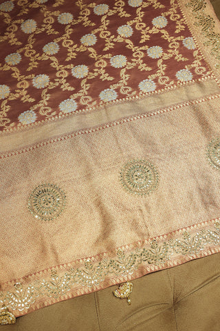 Dusty Peach Banarasi Silk Floral Woven Saree with Gota and Beads Work