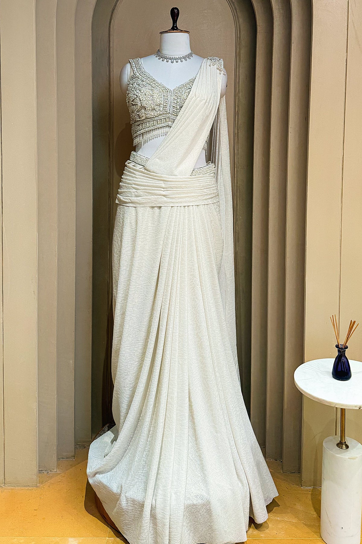 Off White Imported Lycra Ready-made Saree with Cutdana and Diamond Work