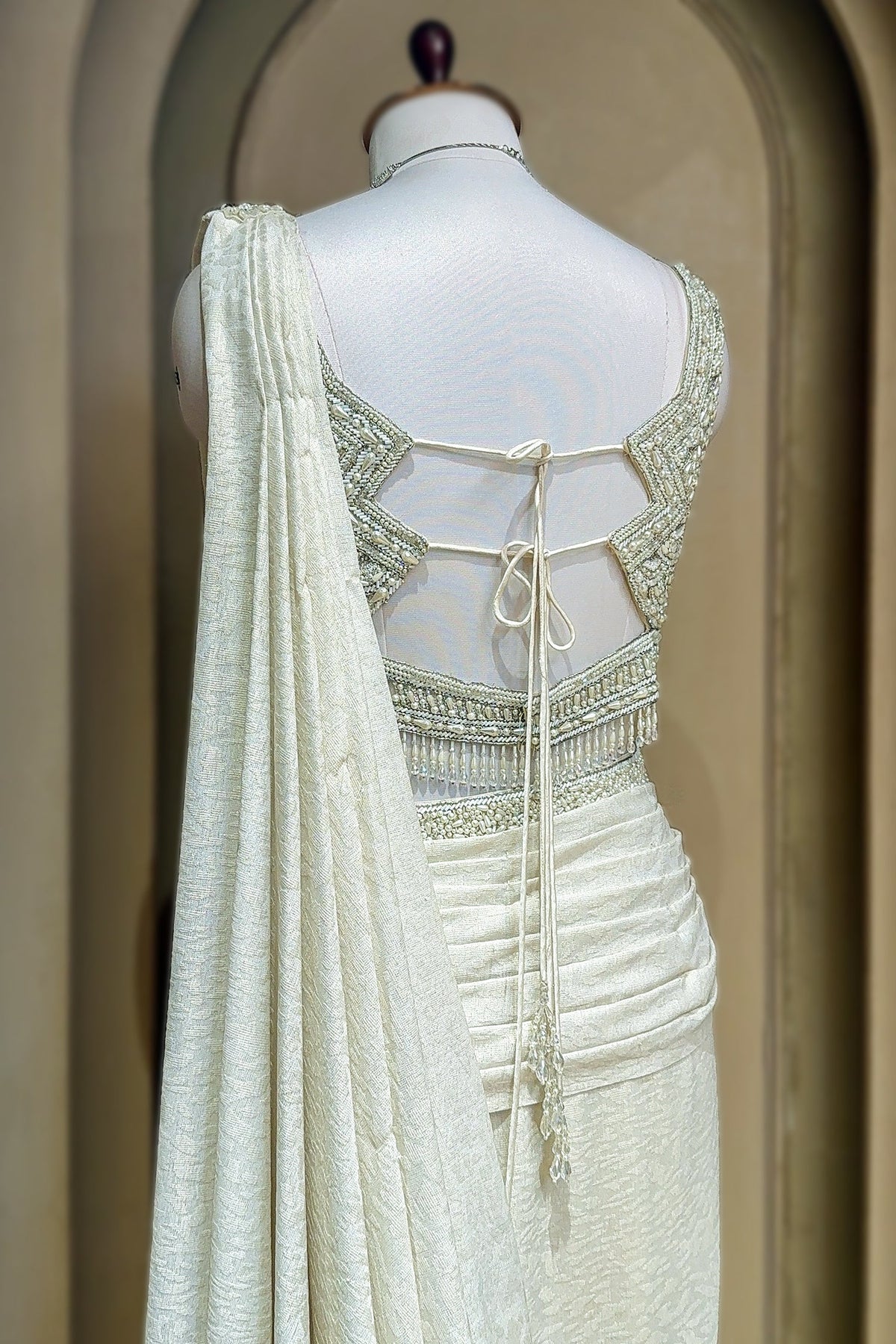 Off White Imported Lycra Ready-made Saree with Cutdana and Diamond Work