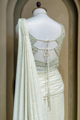 Off White Imported Lycra Readymade Saree with Cutdana and Diamond Work