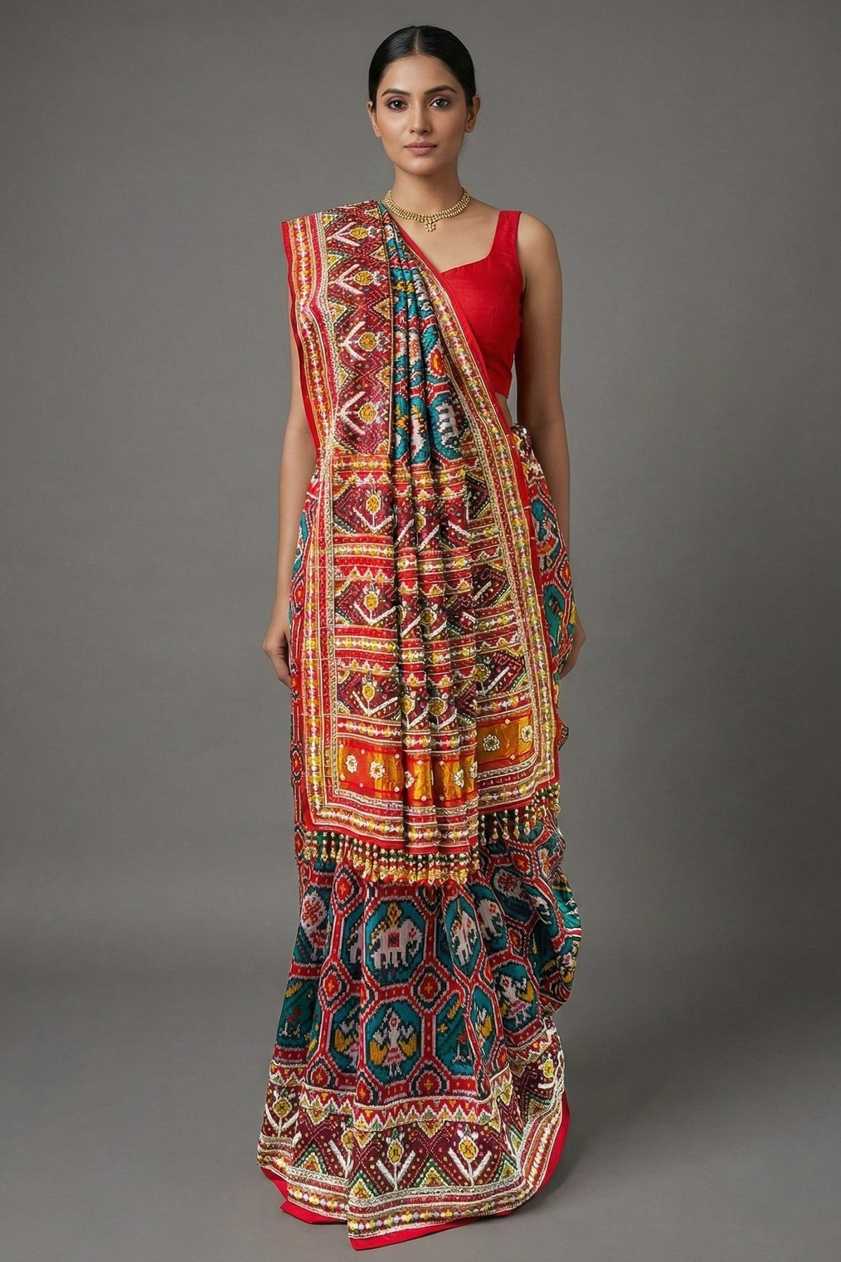 Green Silk Traditional Patola Saree with Multi Colored Bead and Mirror Work