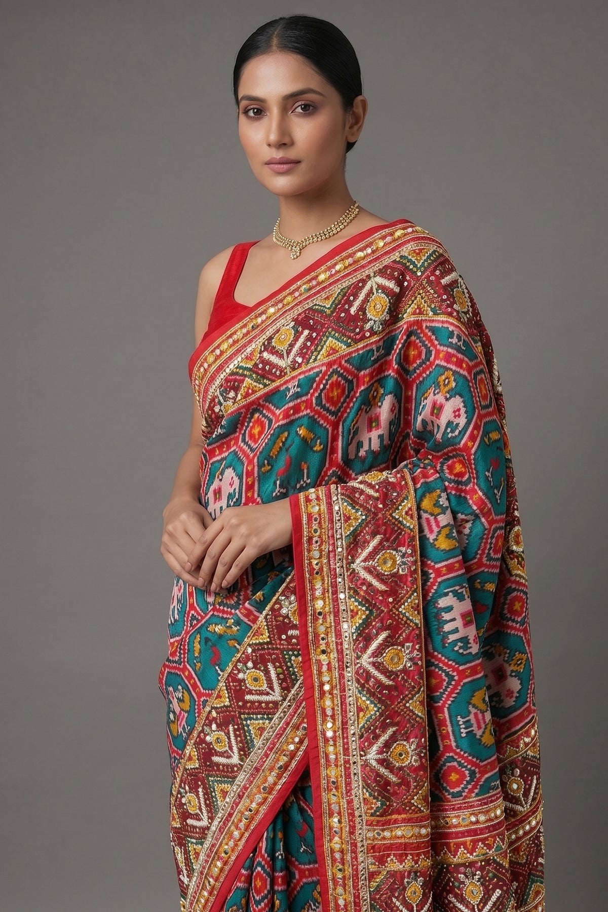 Green Silk Traditional Patola Saree with Multi Colored Bead and Mirror Work