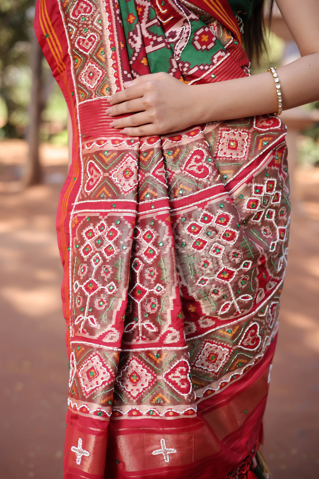 Green Silk Traditional Patola Saree with Beaded Work
