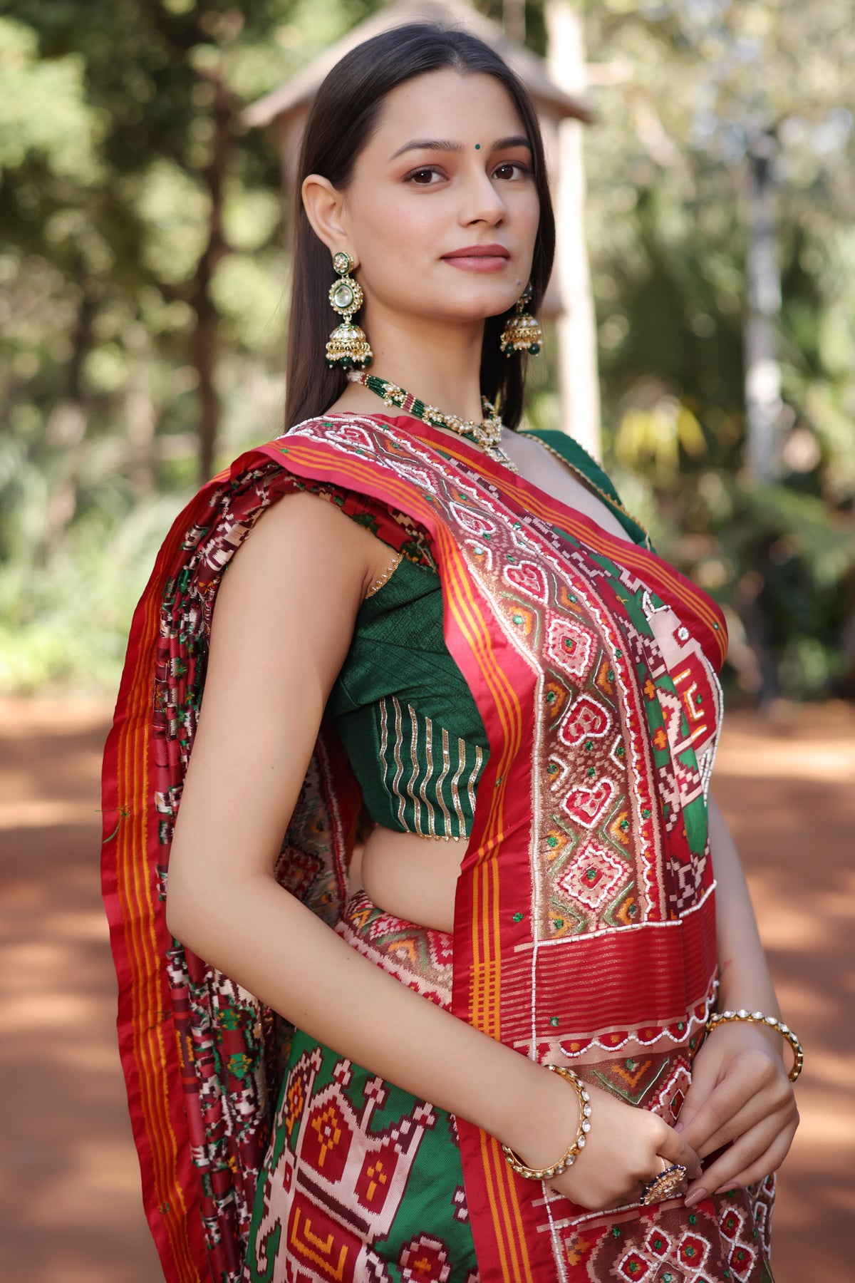 Green Silk Traditional Patola Saree with Beaded Work