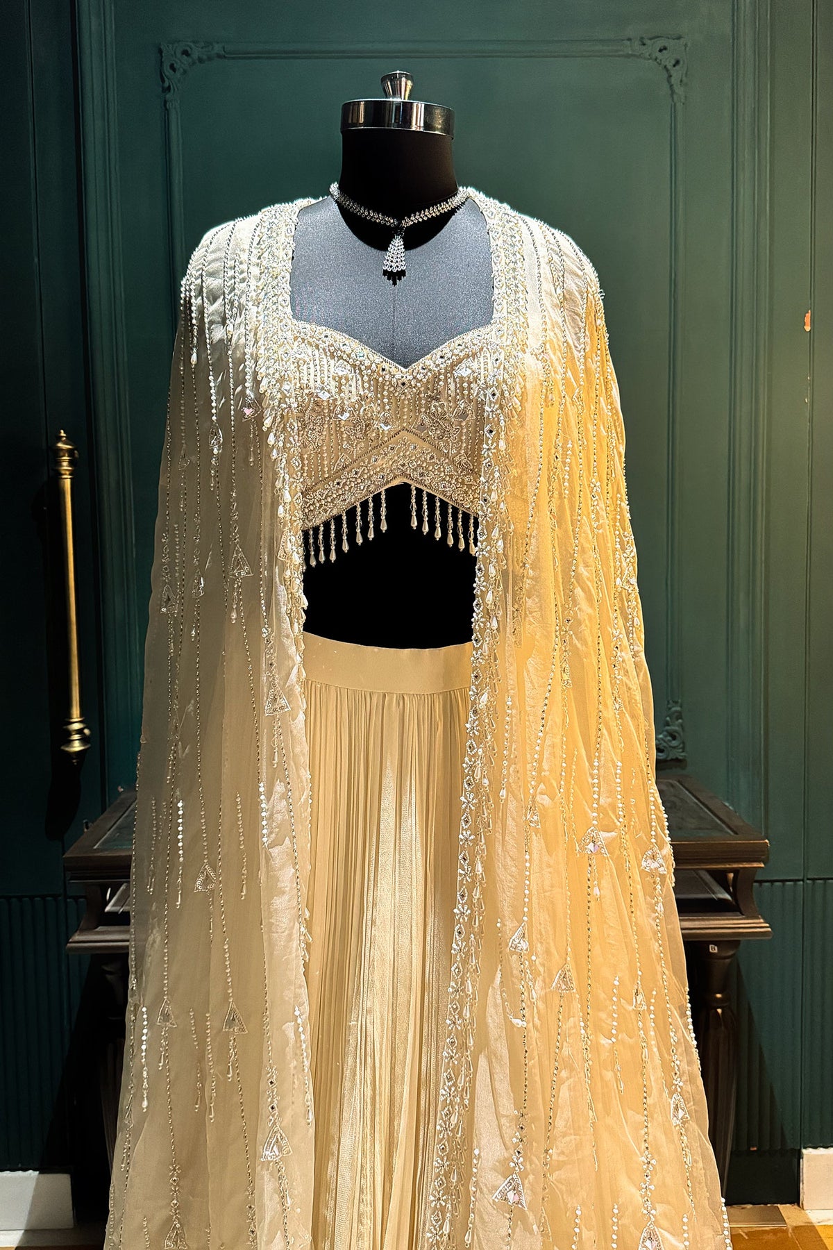 Ivory White Net Embellished Crop Top Lehenga with Long Shrug