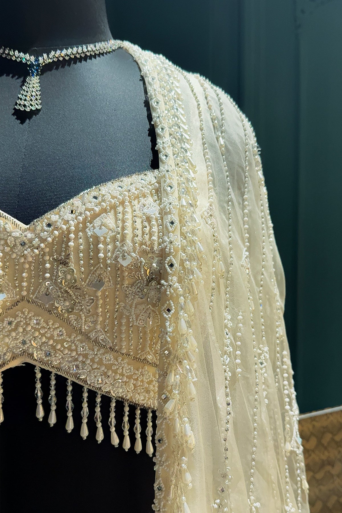 Ivory White Net Embellished Crop Top Lehenga with Long Shrug