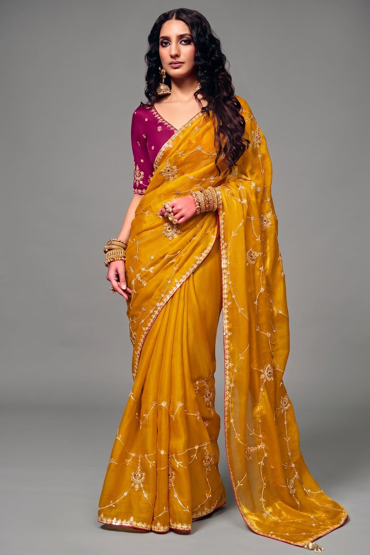 Mustard Yellow Organza Satin Saree With Heavy Sequin Embroidery And Contrasting Magenta Blouse Main image
