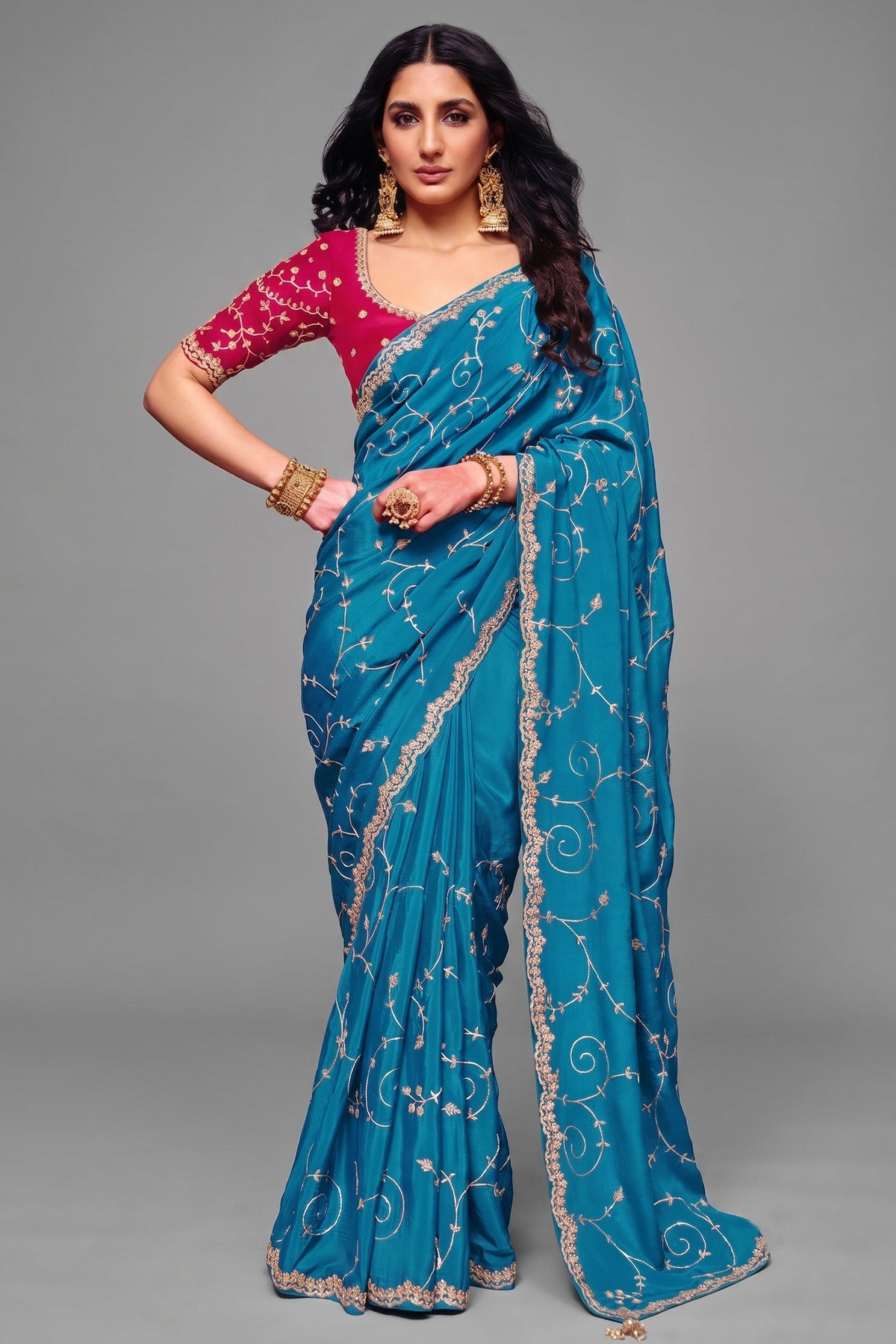 Vibrant Turquoise Satin Silk Saree with Heavy Sequin Embroidery And Pink Blouse Main image