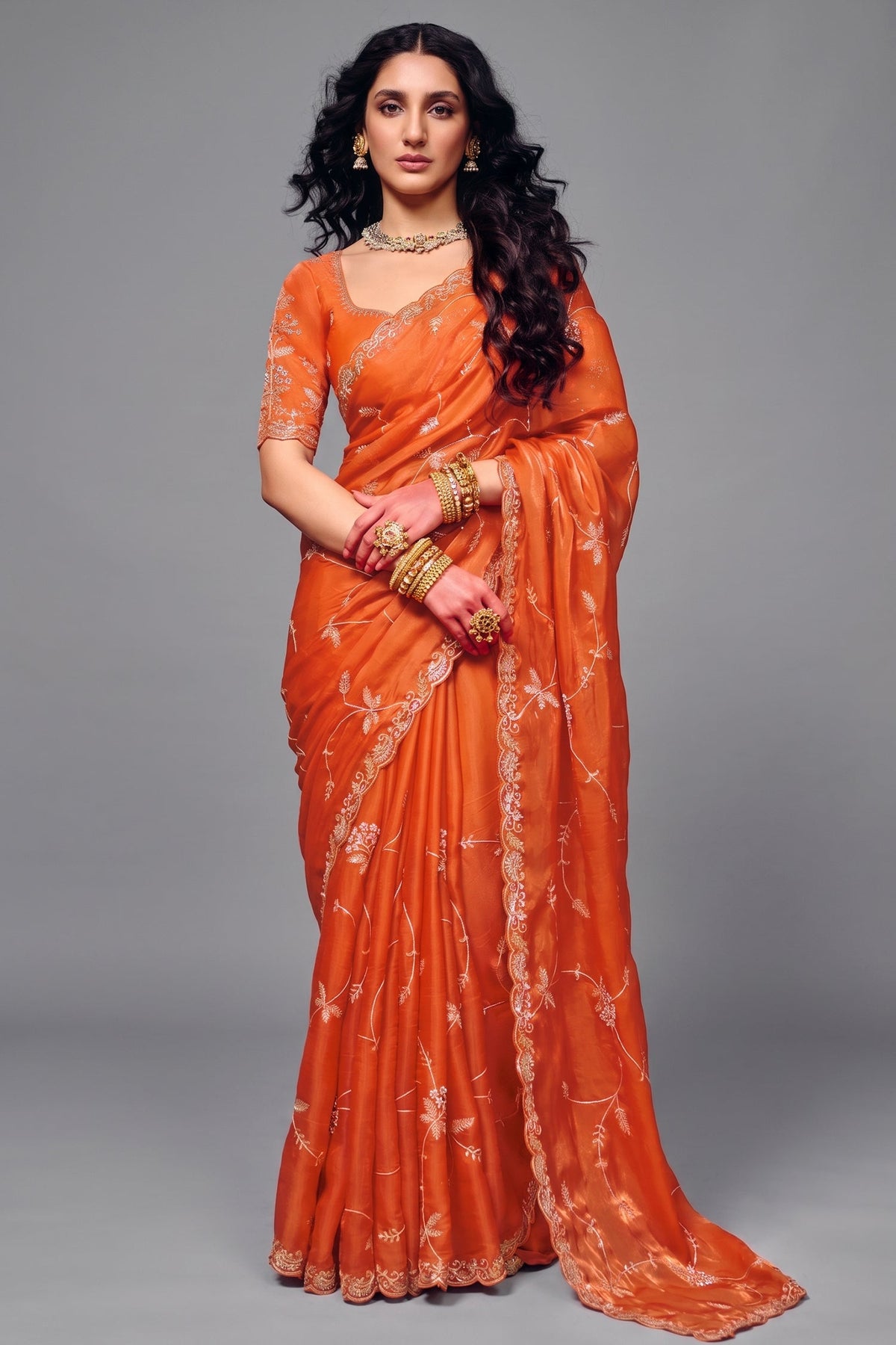 Tangerine Orange Organza Satin Saree Highlighted with Heavy Sequin Embroidery Main image