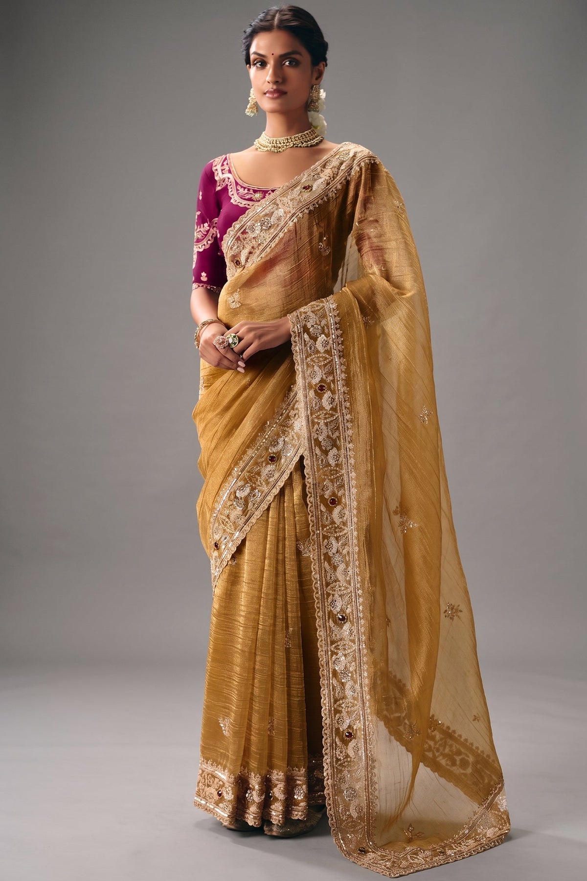 Honey Mustard Organza Saree Showcasing Heavy Border Work Main image