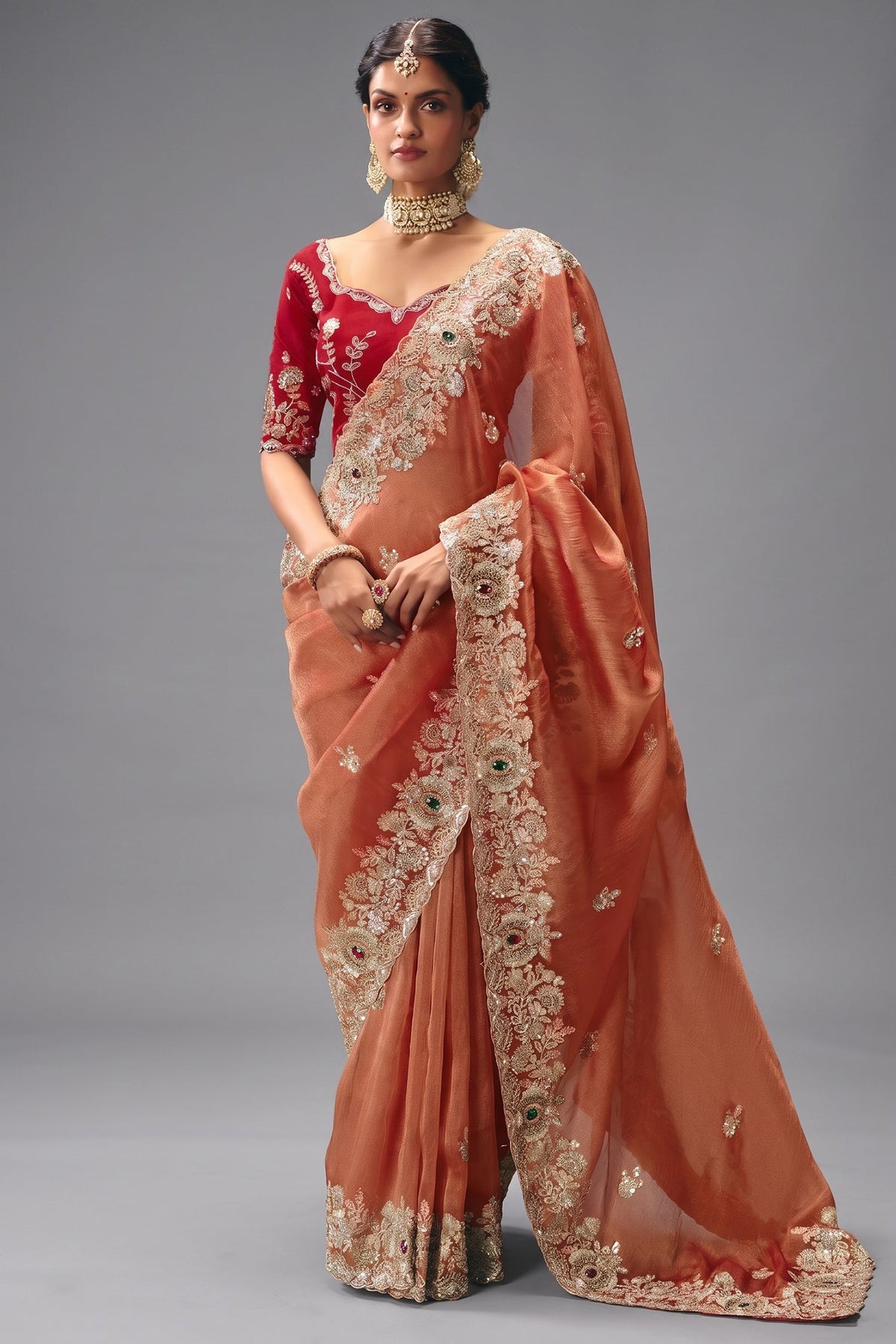 Rust Salmon Saree Highlighting Rich Floral Border Work