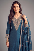 Close up of detailed floral thread embroidery on rama blue palazzo suit