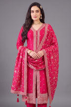 Close up of sequin and thread embroidery on rani pink art silk suit