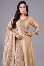 Close up of intricate embroidery work on cream art silk anarkali suit