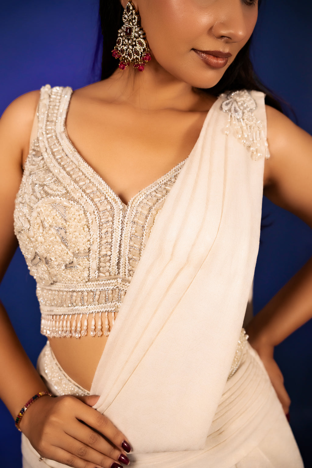Off White Imported Lycra Readymade Saree with Cutdana and Diamond Work