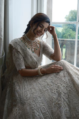 Off White Heavy Dori Embroidery Sequin Worked Lehenga in Net with Paisley and Floral Motifs