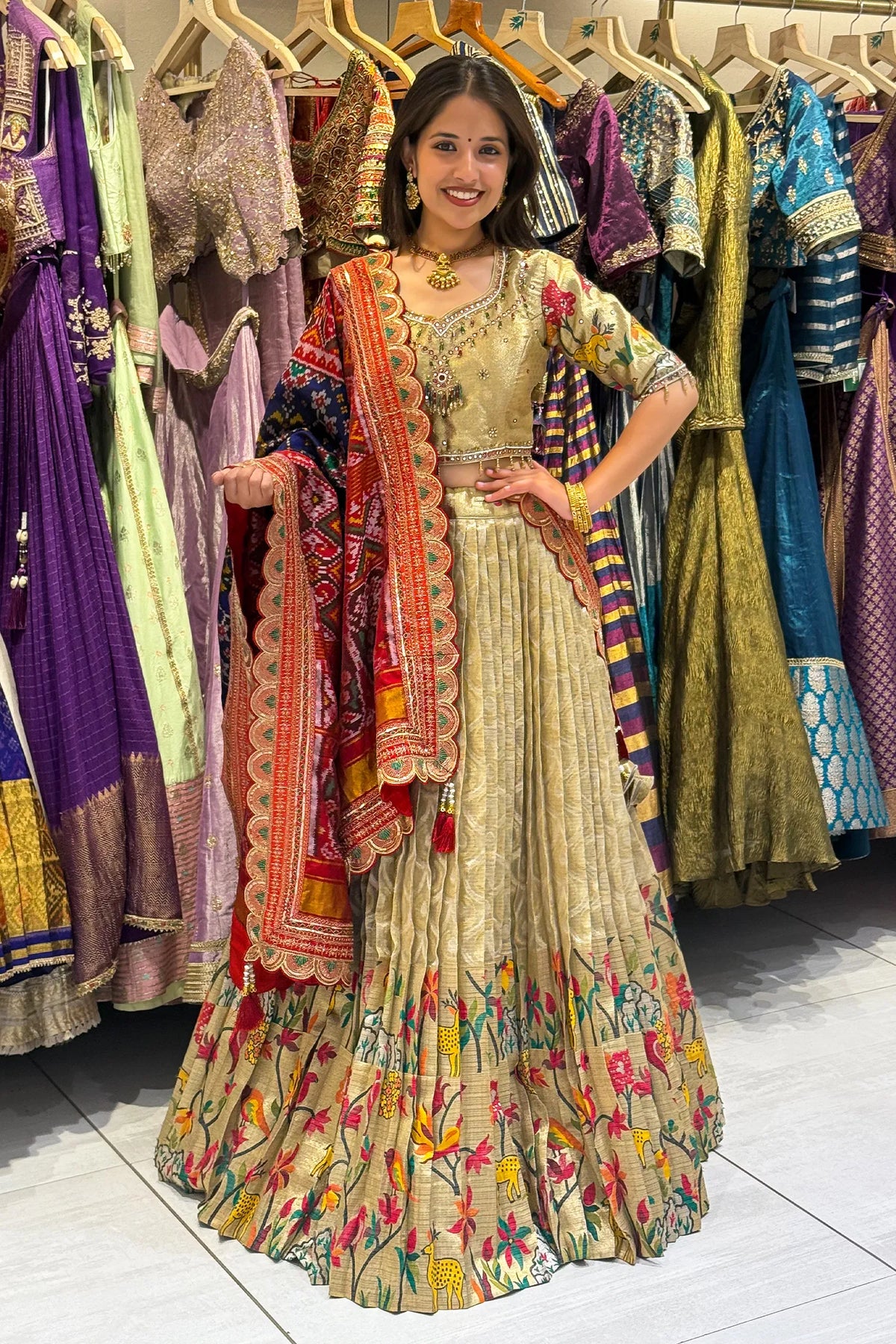 Golden Tissue Pleated Lehenga with Animal and Bird Motif Lehenga with Patola Dupatta