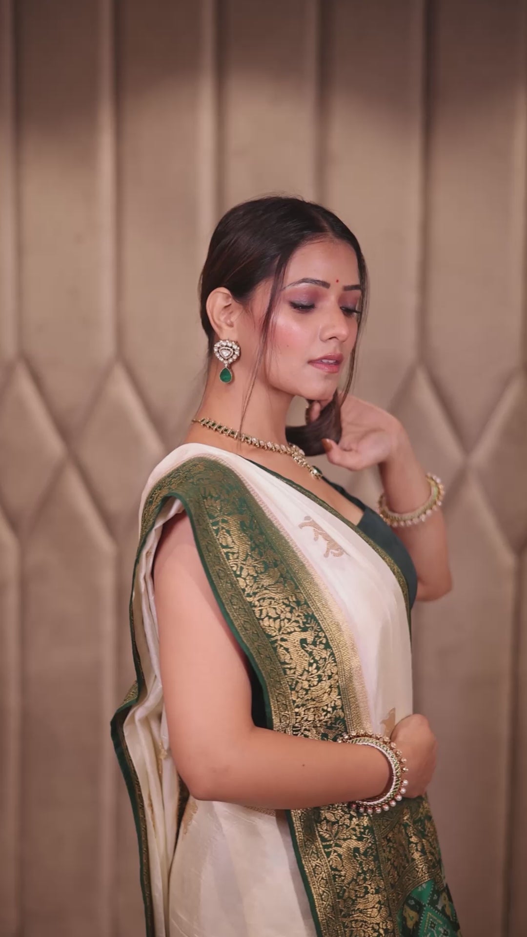 Off White Dola Silk Woven Butta Saree with Contrast Patola Border